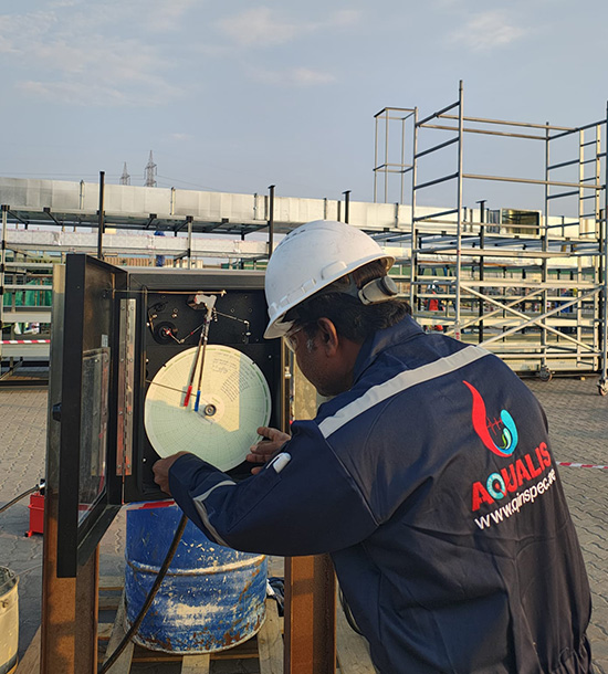 third party inspector performing industrial equipment inspection in Dubai